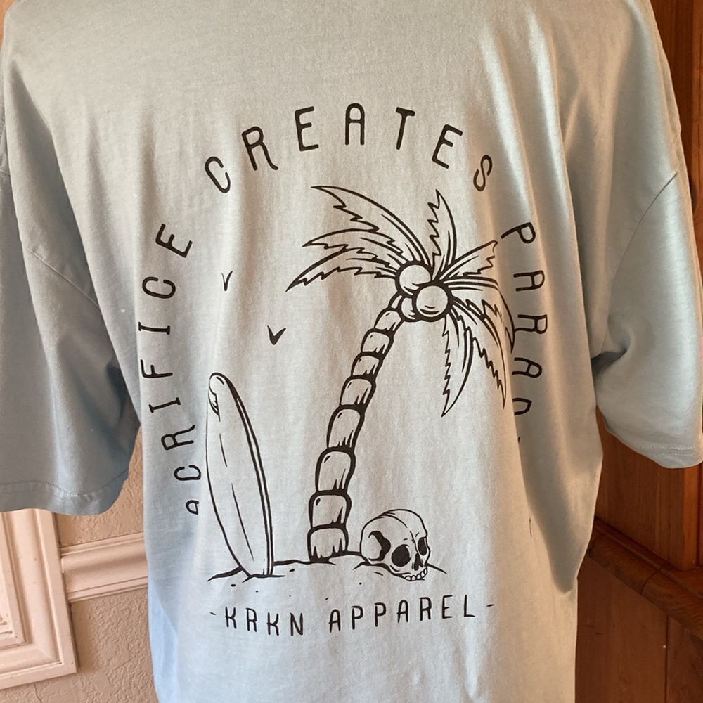 KRKN Men’s Sky Blue Paradise Short Sleeve Crewneck T-Shirt Men’s XL